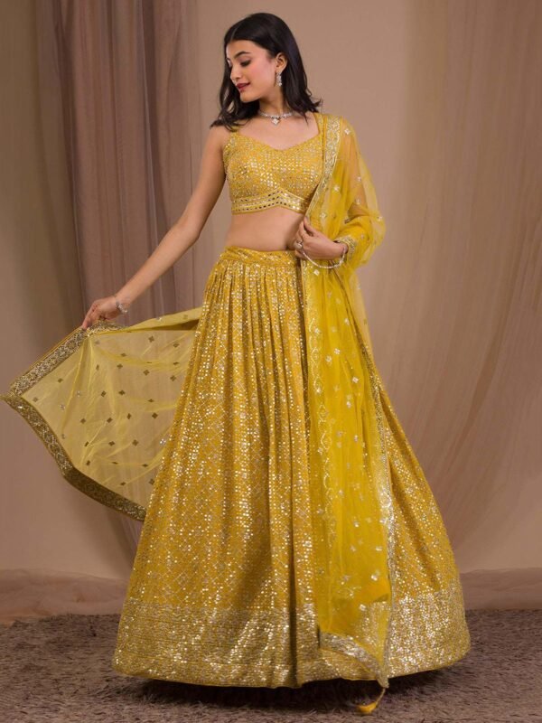 Fascinating Yellow Sequins Georgette Haldi Wear Lehenga Choli